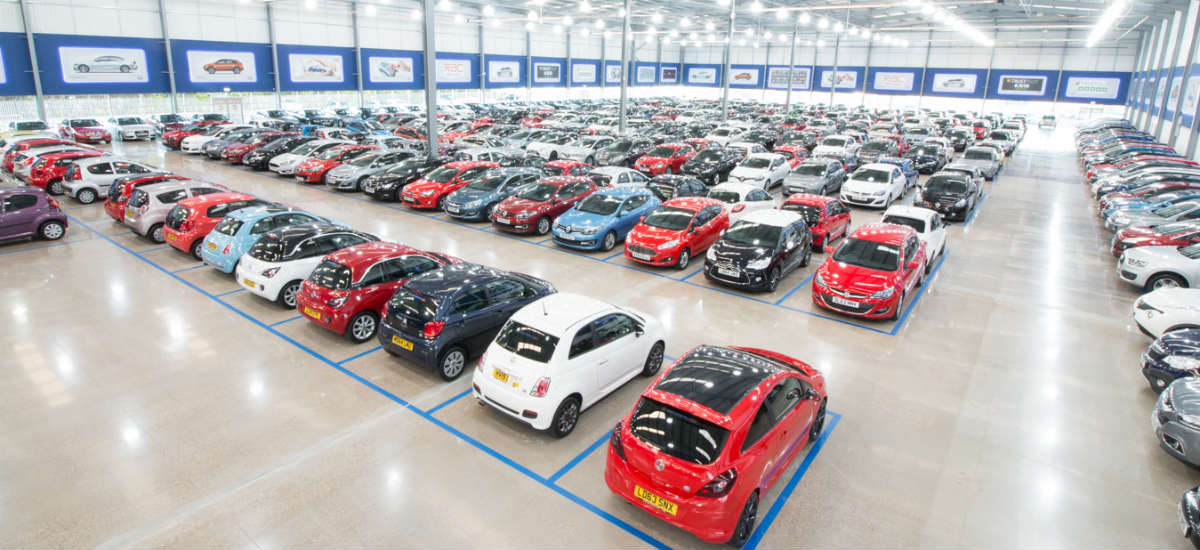 large number of cars in a warehouse